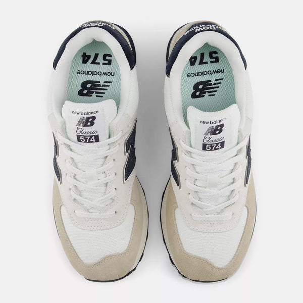 White New Balance sneakers with beige soles on a white background