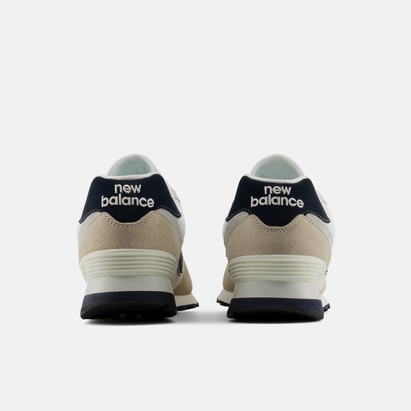New Balance sneakers shown from the back on a white background