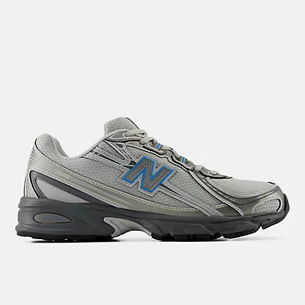 A New Balance athletic shoe in gray and black with a blue 'N' logo on the side, shown against a light gray background.