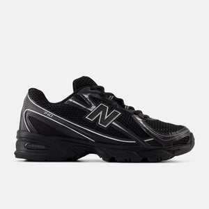 Black unisex athletic shoe with New Balance logo on a light gray background
