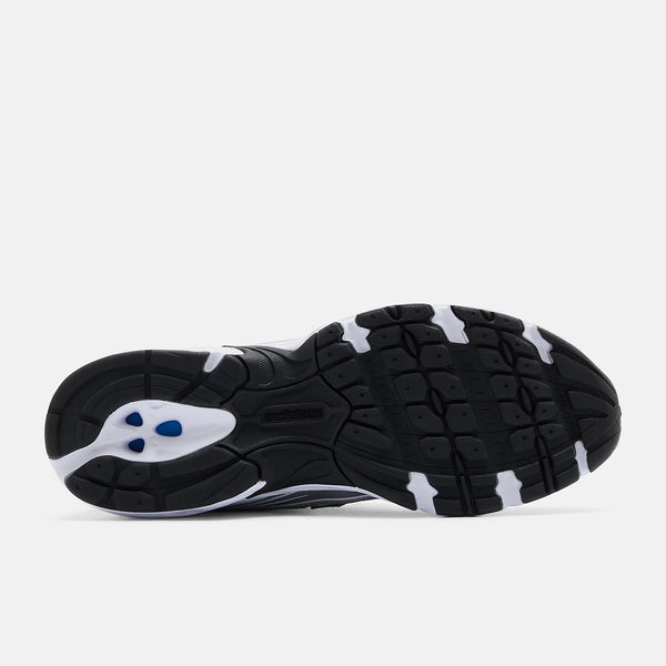 Black and white athletic shoe on a light gray background