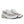 A pair of Unisex NB 990 V6 shoes with white laces and a white midsole.