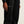 Black pants with Craft logo on a plain background