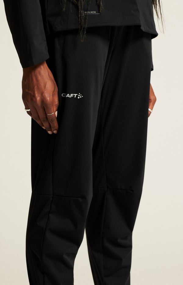 Black pants with Craft logo on a plain background