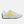 White sneaker with yellow accent and yellow New balance logo on a white background.