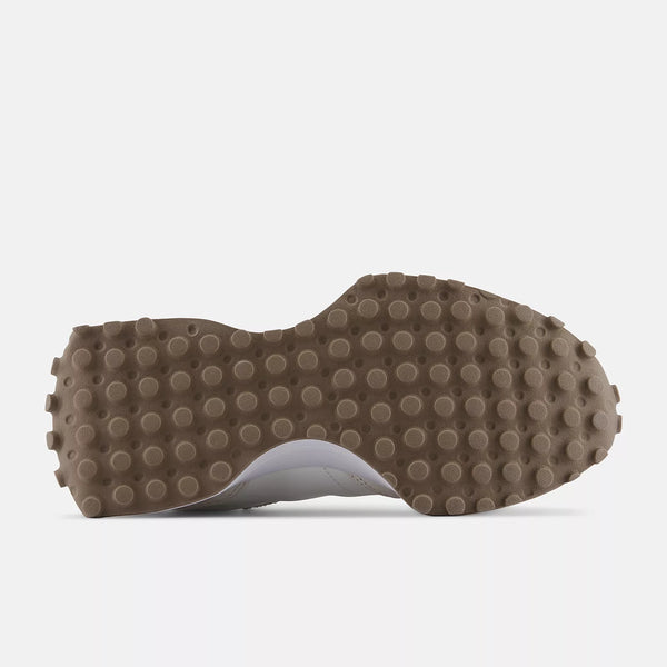 Brown textured sole of a shoe on a white background