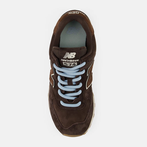 Brown New Balance sneaker with blue laces on a white background