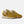 A pair of New Balance 574 sneakers in a mustard yellow and brown colorway, featuring a white 'N' logo and white midsoles, set against a light gray background.
