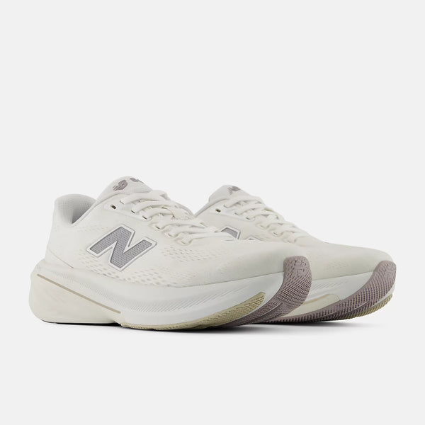 A pair of women's white 860V15 that has laces that match the upper.