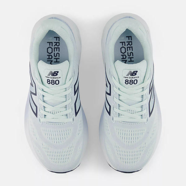 Pair of New Balance 880 running shoes on a white background