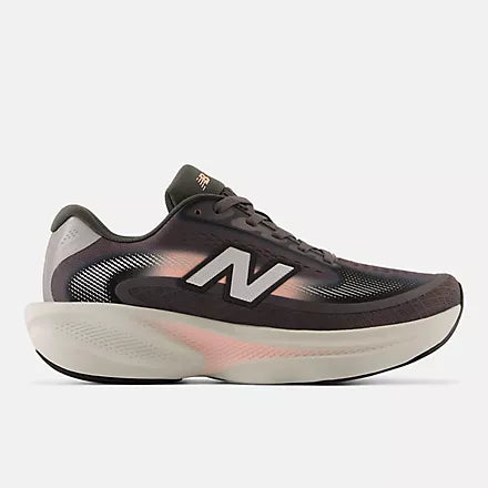 A pair of New Balance running shoes in dark brown and black with a white midsole and subtle pink accents, shown against a light gray background.