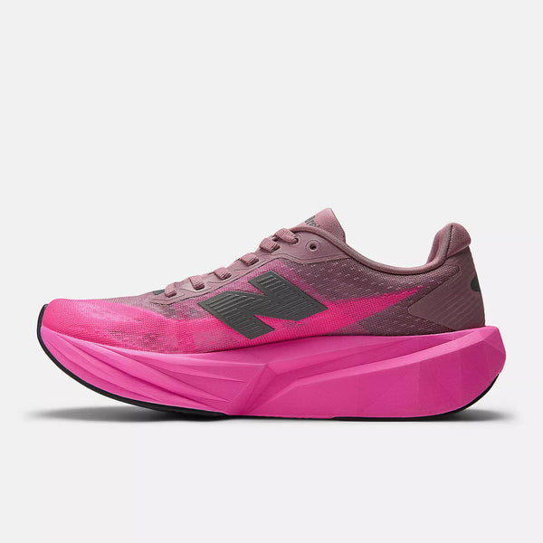 Pink and purple running shoe with a brand logo on a light gray background