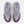 A pair of New Balance FuelCell Rebel v4 running shoes in a light lavender and dark purple colorway, shown from a top-down view on a light gray background.
