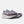 A pair of New Balance running shoes in a muted purple and gray colorway, featuring a thick white and purple midsole, shown against a light gray background.