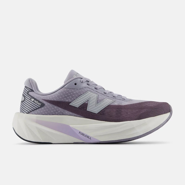 Purple running shoe with white sole on a light gray background