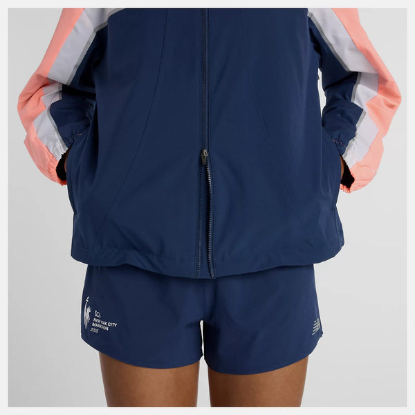 A relaxed fit silhouette features modern lines with reflective elements, inspired by the original’s signature color blocking stripes. 