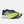 Navy and green running shoe with New Balance logo on a light gray background