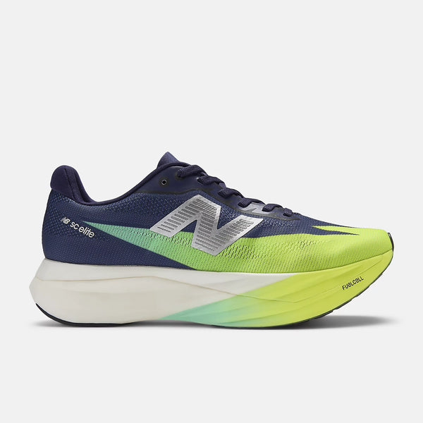 Navy and green running shoe with New Balance logo on a white background