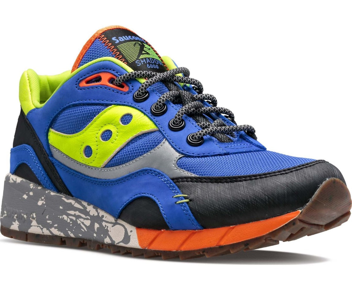 Everything about the Men's Saucony Shadow 6000 Trail was inspired by the great outdoors. This lifestyle shoe sports an upper made with the same materials used in Running Trail Performance shoes and strikes the perfect balance of bold bright colors and natural, Earthy vibes. Just like a classic trail running shoe, it features rounded laces. Perfect for hanging around and channeling all of life's natural beauty.
