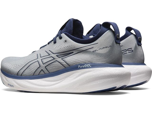 Back angled view of the Men's ASIC Gel Nimbus 25 in the color Sheet Rock/Indigo Blue