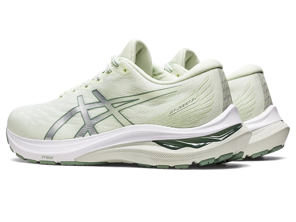 Back angled view of the Women's ASICS GT 2000 Version 11 stability shoe in the color Whisper Green / Pure Silver