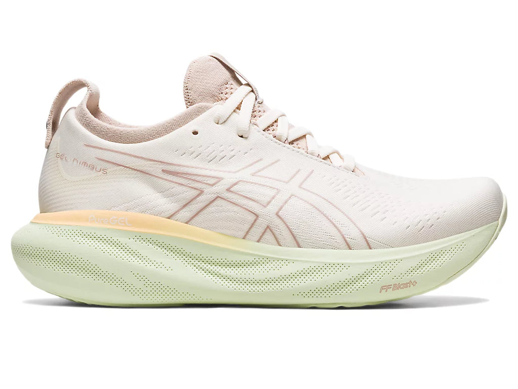 Lateral view of the Women's ASICS Nimbus 25 in the color Cream / Fawn