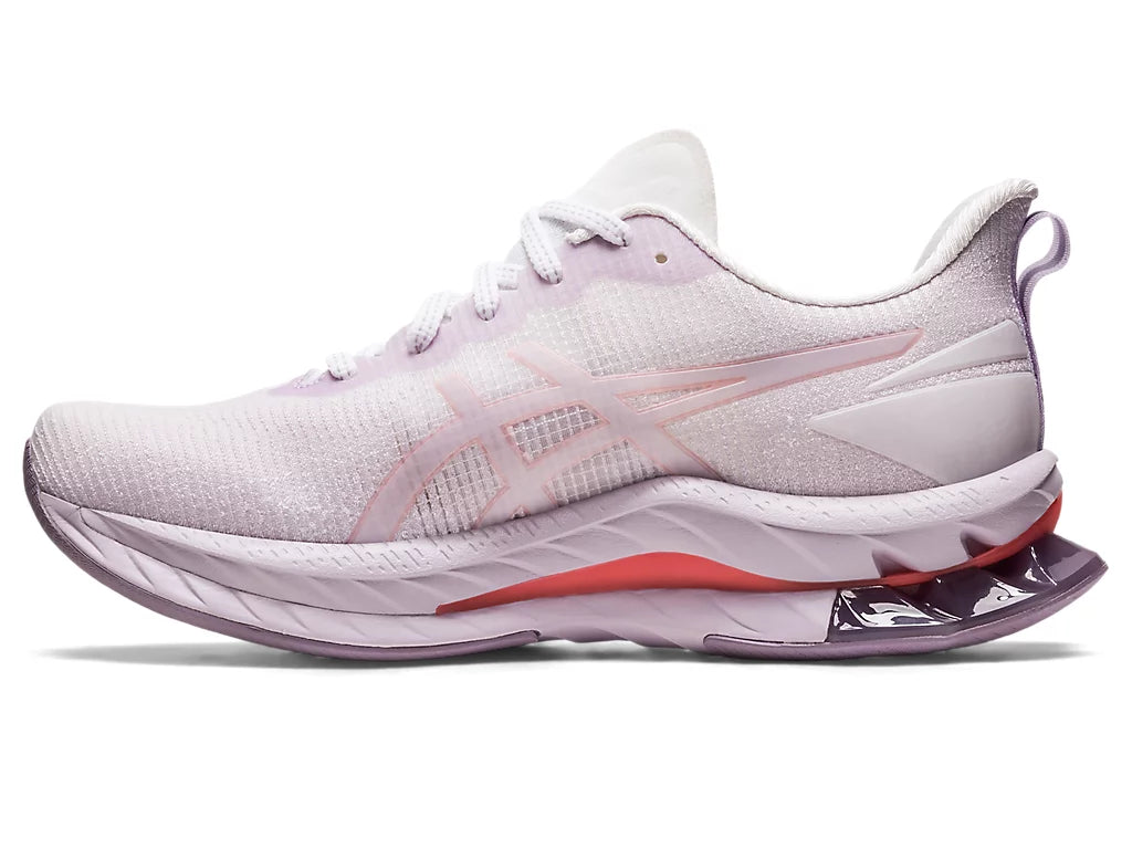 Medial view of the ASIC Women's Gel Kinsei Blast LE 2 in the color White/Papaya