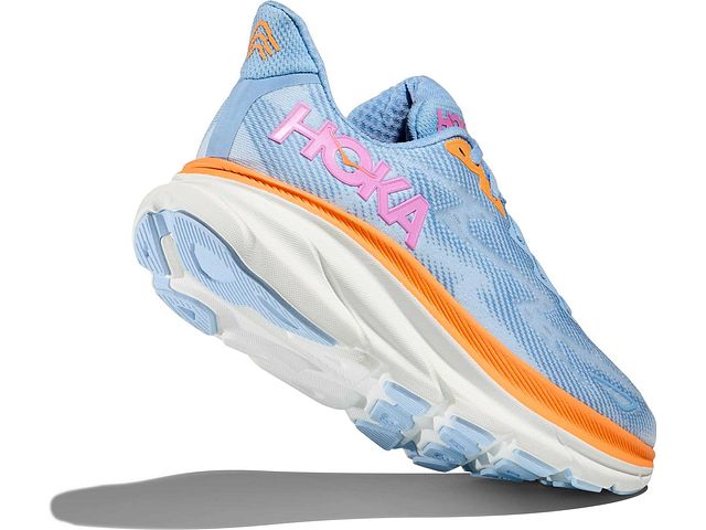 Back angled view of the Women's HOKA Clifton 9 in the wide D width, color Airy Blue/Ice Water