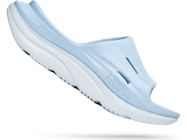 Angled lateral view of the Women's Ora Recovery Slide 3 in the color Ice Water/Airy Blue