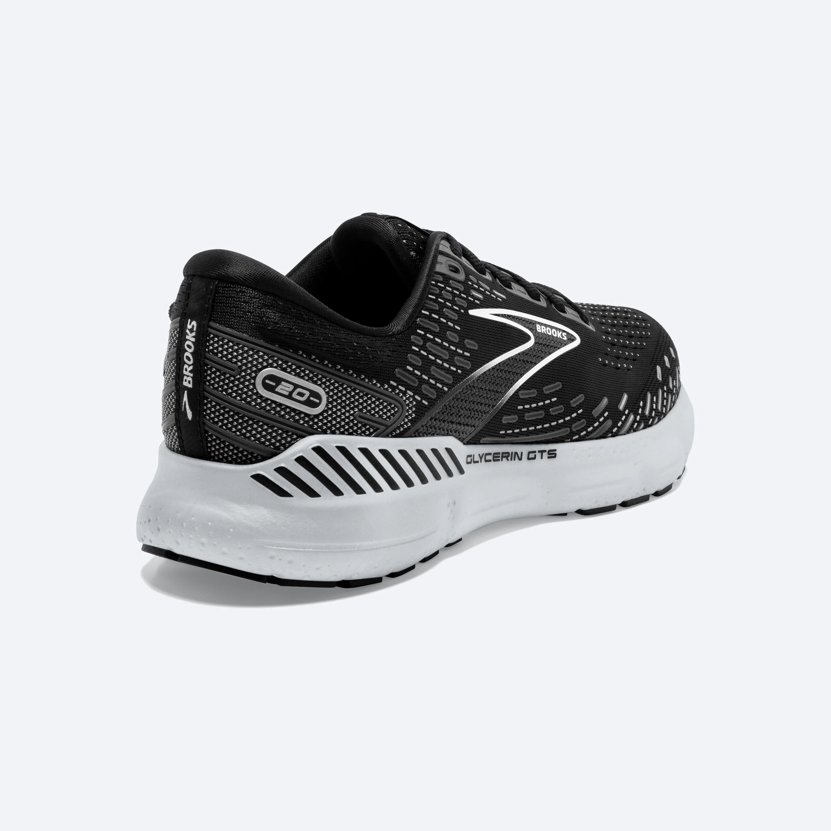Back angle view of the Women's Glycerin GTS 20 in the wide D width, color Black/White/Alloy