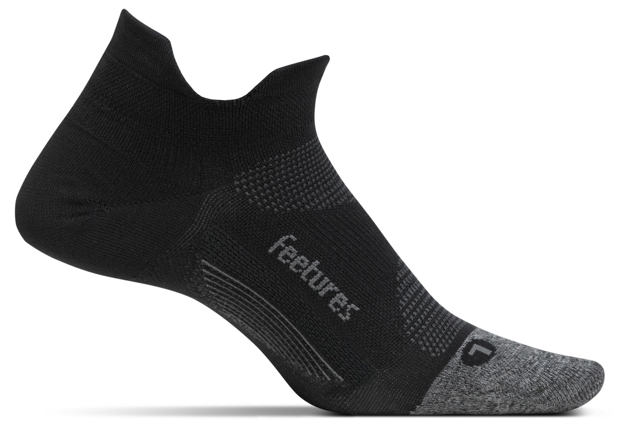 A medial view of the Feetures Elite Ultra Light no show running sock (left foot) in the color black