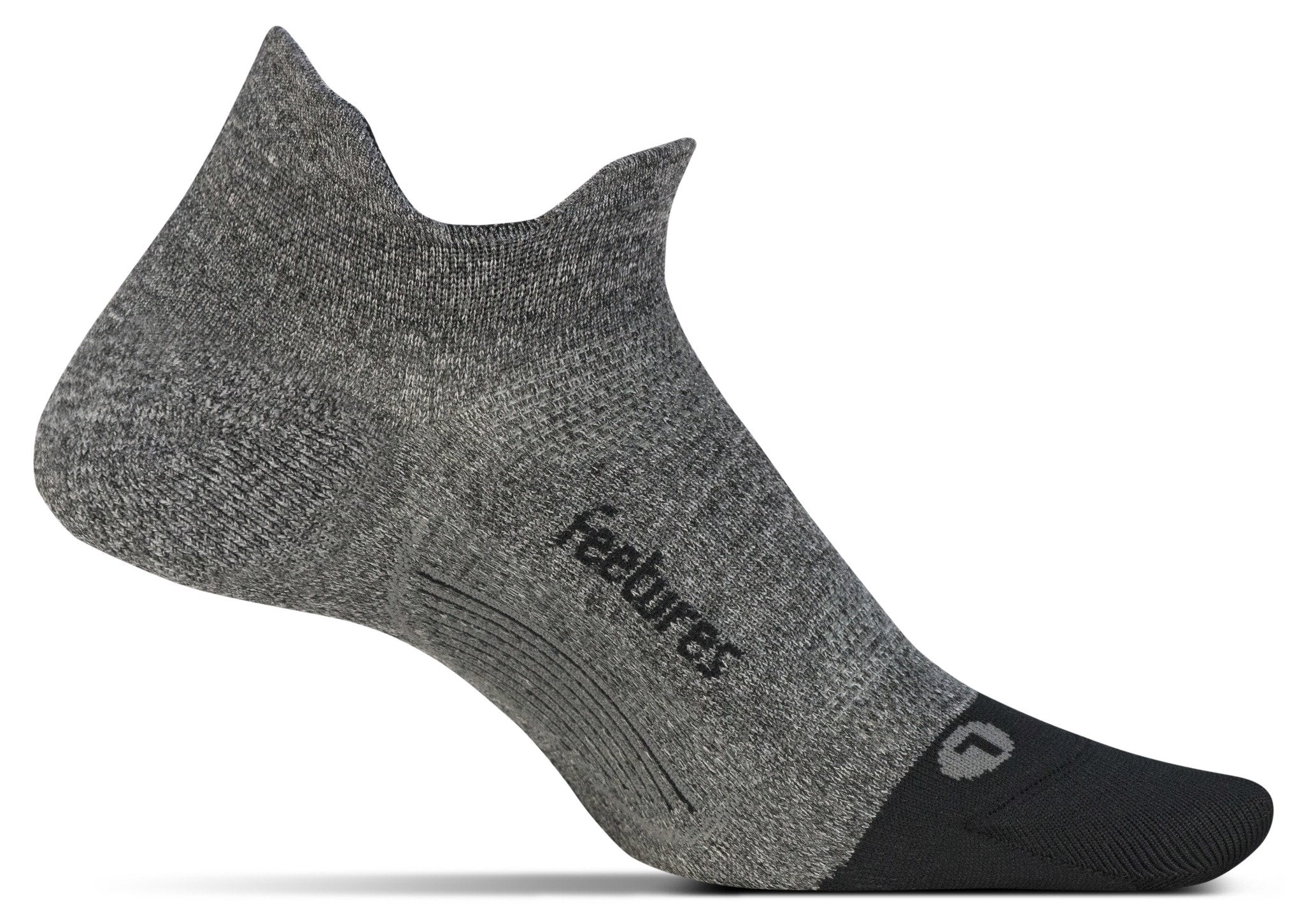 A medial view of the Feetures Elite Ultra Light no show running sock (left foot) in the color grey