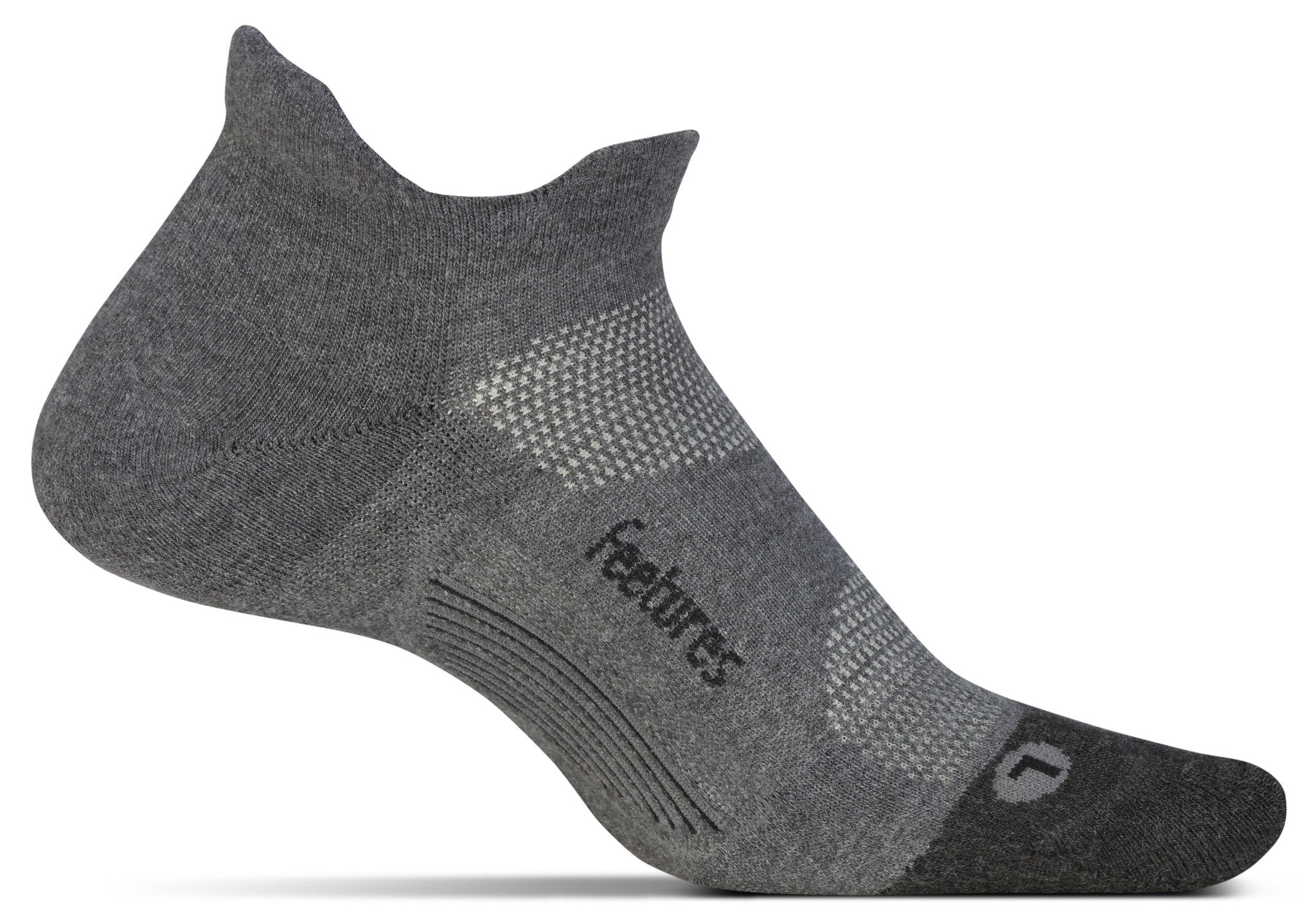 A medial view of the Feetures Elite Max Cushion running sock (left foot) in the color grey.