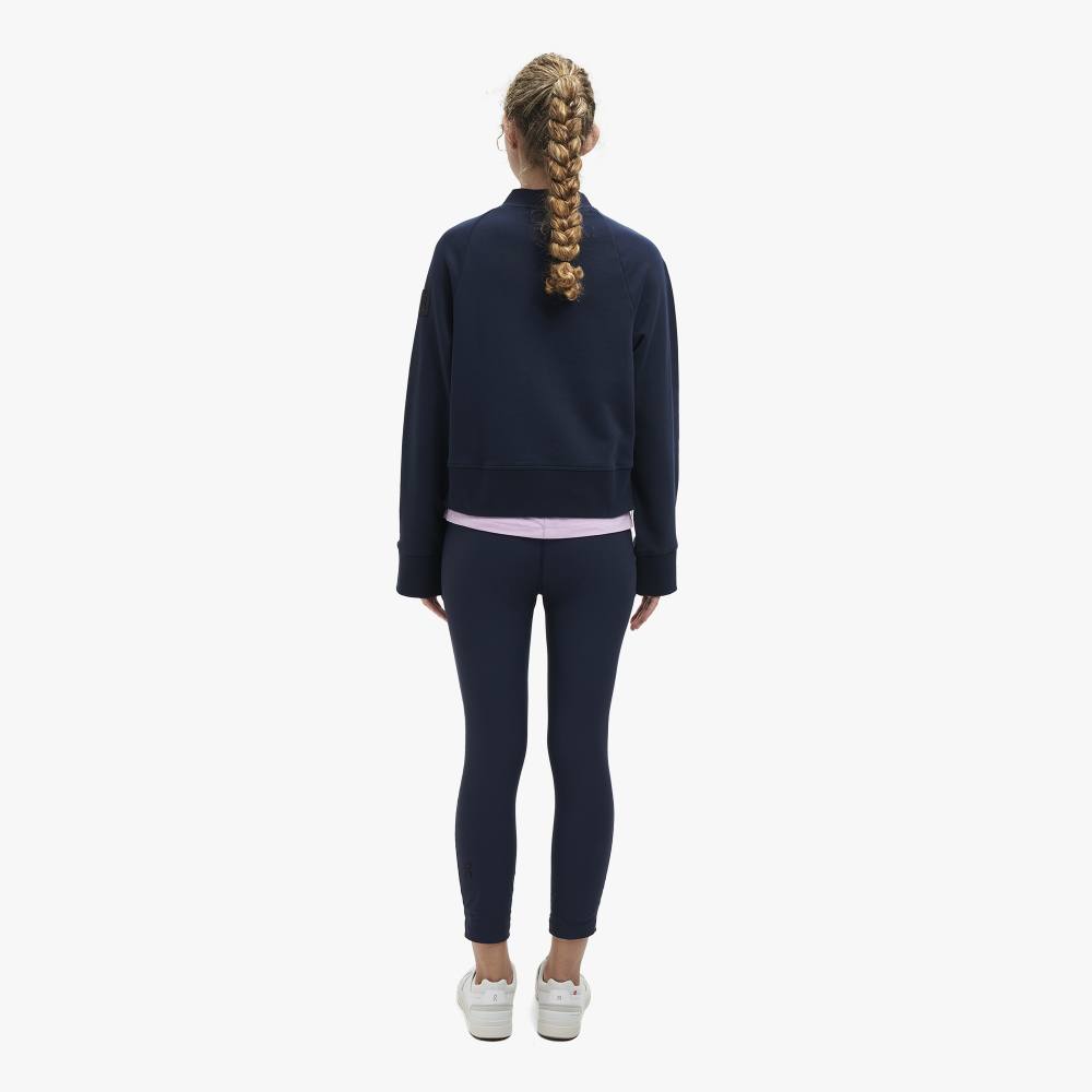 Back view of a model wearing the Women's Crew Neck by ON in the color Navy