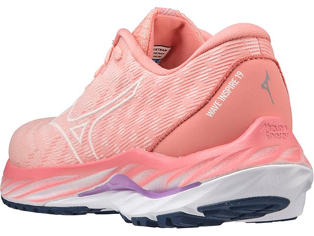 Back angled view of the Women's Wave Inspire 19 SSW in the color Peach Bud / Vaporous Grey
