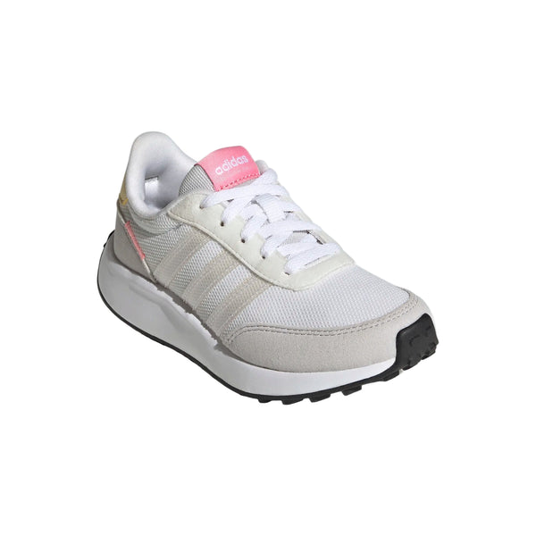 The tongue on these kids adidas shoes is pink.