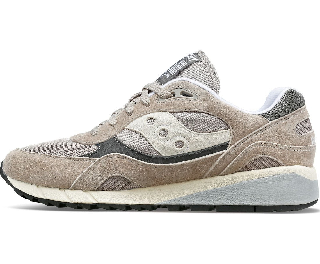 The medial side of this men's Shadow 6000 grey essentials shoe is almost a complete mirror image of the lateral side