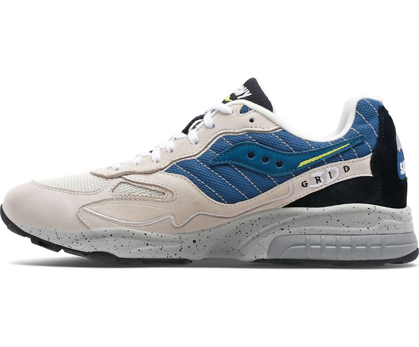 The lateral view of theis Mens shoe shows the Saucony logo and the Grid word