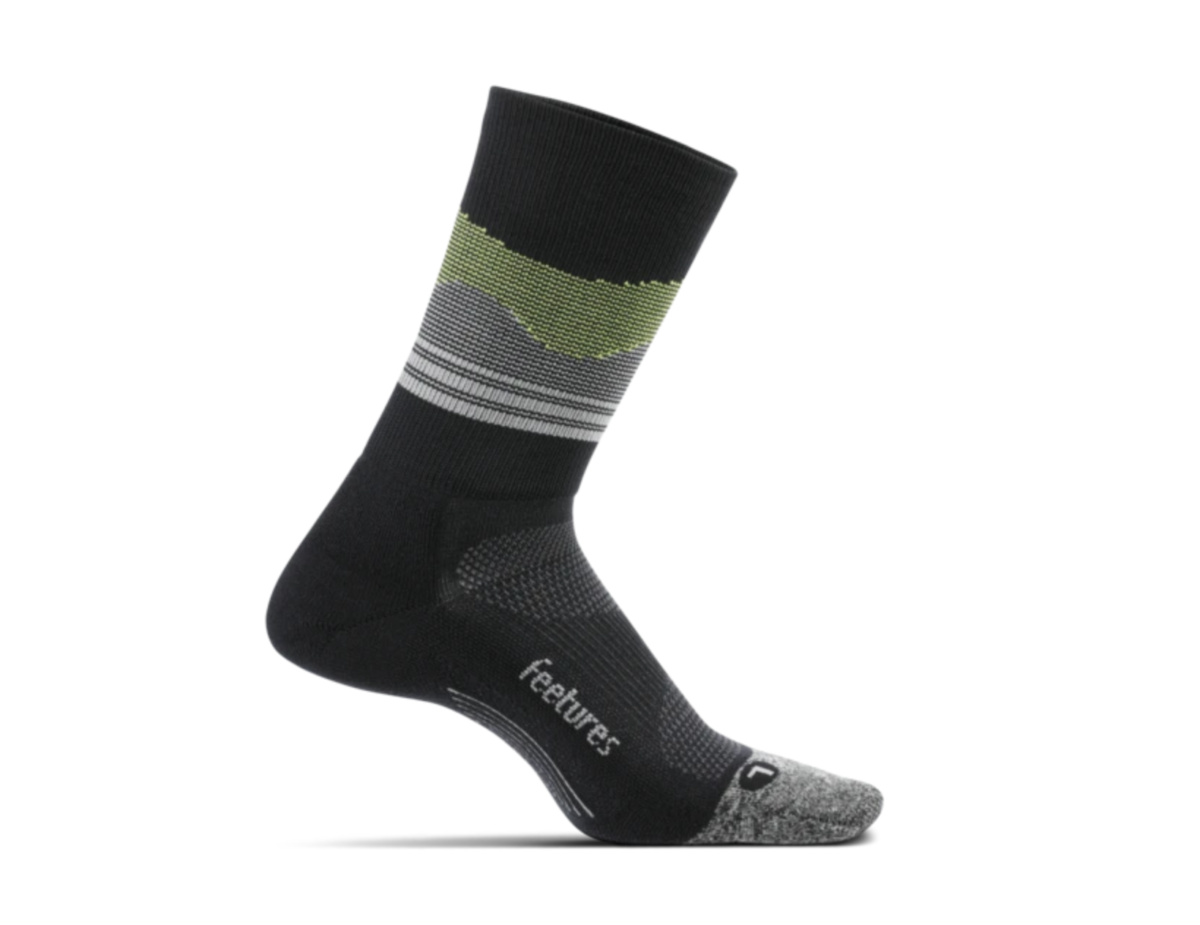 Medial view of the Feetures Elite Light Cushion crew sock in the color Black Daybreak
