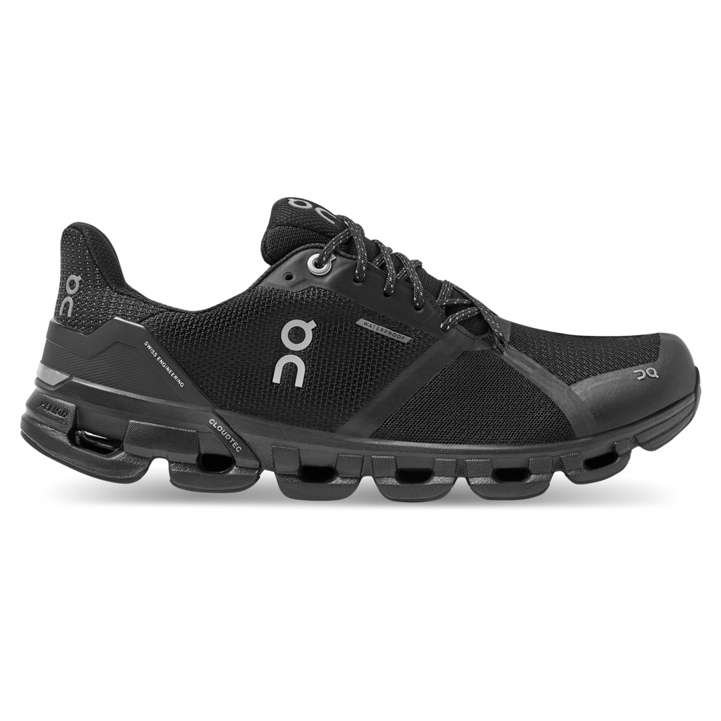 Lateral view of the Women's Cloudflyer -Waterproof by On in the color Black / Lunar