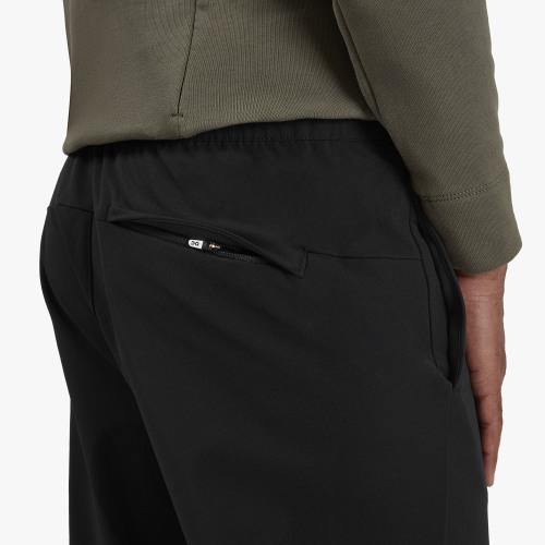 Zoomed in back pocket view of the Men's Active Pant by On in the color Black