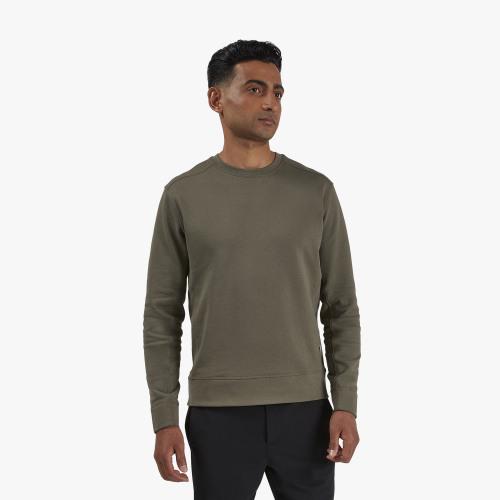 Front view of a model wearing the Men's Crewneck by ON in the color Olive