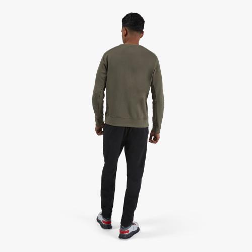 Back view of a model wearing the Men's Crewneck by ON in the color Olive