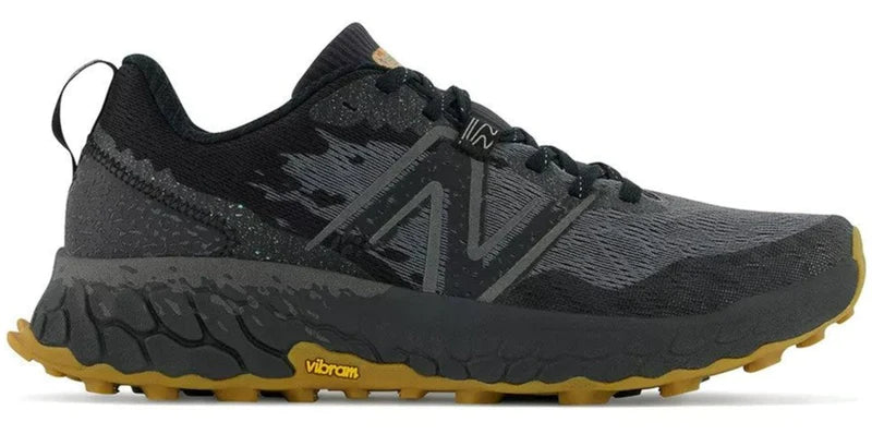Lateral view of the Men's Hierro V7 trail runner by New Balance in the color Black/Black