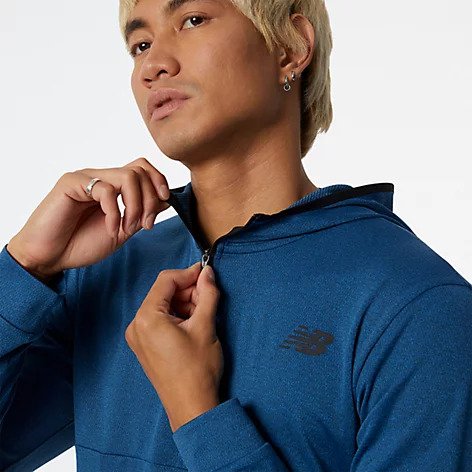 Zoomed in front view of the Men's Tenacity Hooded 1/4 Zip by New Balance in the color Serene Blue
