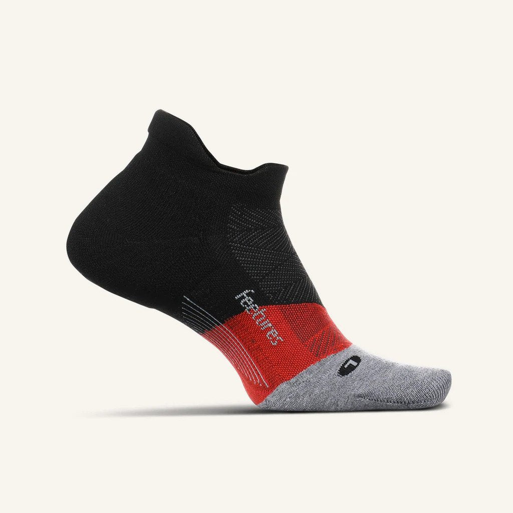Medial view of the Feetures Elite Max cushion no show tab sock in the color bounce black