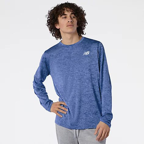 Front view of a model wearing the Men's Tenacity Long Sleeve by New Balance in the color Serene Blue Heather