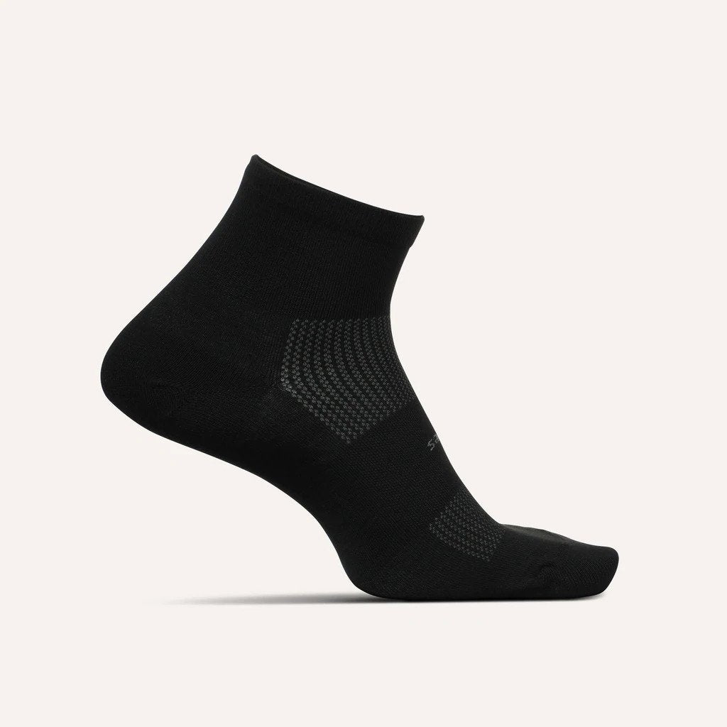 Medial view of the Feetures High Performance Ultra Light cushion sock Quarter height in the color black