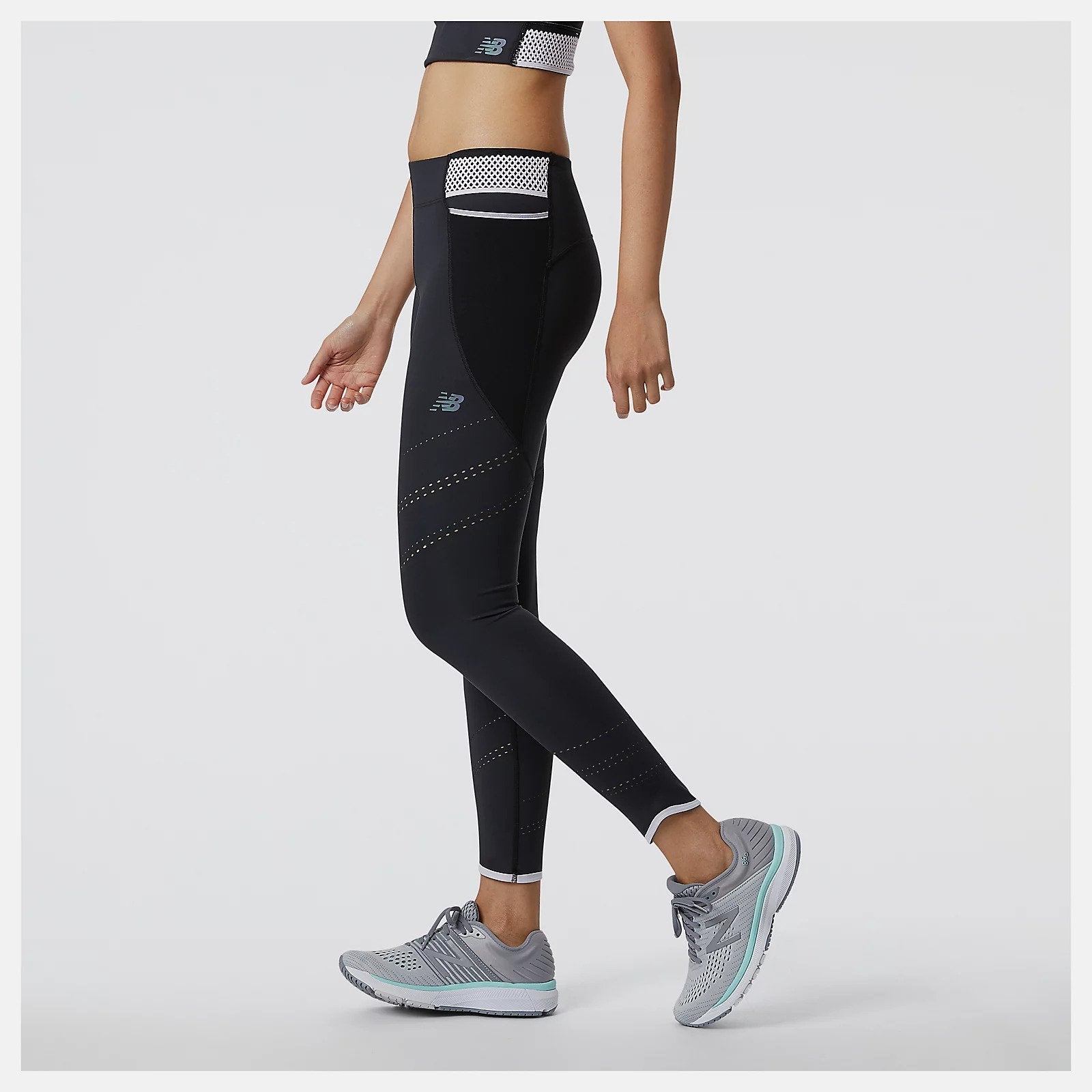 Made for your run or workout, our versatile Q SPEED Shape Shield Tight uses Shape Shield fabric to offer coverage and a lightweight, soft feel so you stay focused on your performance. With NB DRYx to wick away moisture, these women's workout leggings also have mesh panel pockets and perforations for added breathability and a hint of style. Drop-in mesh pockets leave space for the essentials.