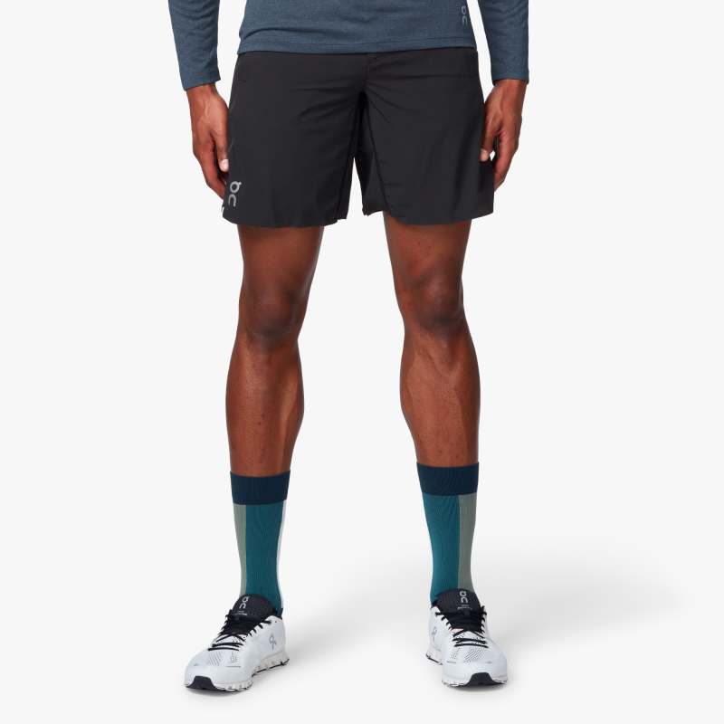 Front view of the Men's ON 2-in-1 running shorts in the color black.